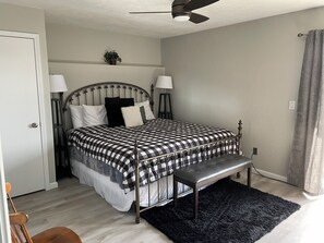 Unit 1 master suite---ensuite bathroom, access to back deck