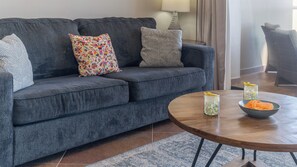 Close up on coffee table and sofa.