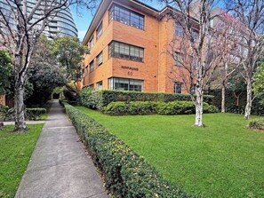 Beautifully maintained block with manicured gardens