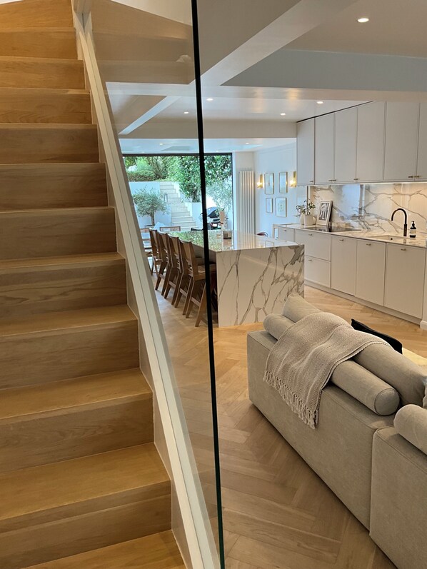 Expansive large open plan kitchen that opens out onto the garden