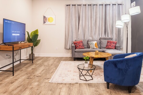 Modern comfort: Inviting living space with a touch of Philly charm. #ModernLiving #ColorfulAmbiance