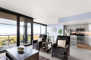 Modern renovations and ocean views with floor to ceiling windows and lanai.