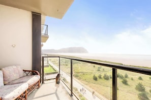 Outdoor furniture set to enjoy the ocean's refreshing breeze.
