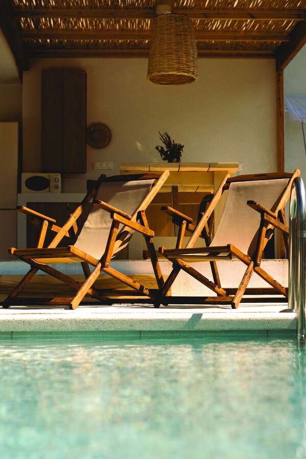 Sunbathe by the pool