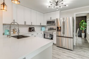 Kitchen | Single-Story House | In-Unit Laundry