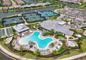 Pool, hottub, bocce ball, tennis, pickleball, fire pits, poolside bar & grill 