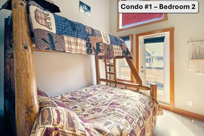 Bunk beds (queen bottom, twin top) in second bedroom