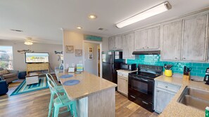 The modern open layout of the common areas of the home allows more space for gathering with loved ones and making memories to last a lifetime.