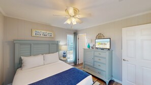 Plush bedding, simple, elegant furnishings, and beautiful flooring complement this queen suite and transform it into a charming haven for rest and relaxation.