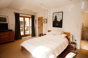 Master bedroom with adjoining ensuite shower room.