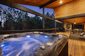 Come sit in our inviting hot tub while looking out to views of nature.