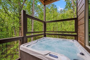 Relax in the bubbling hot tub after a fun day of adventure in the Smokies.