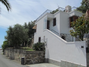 External view of the building, private parking lot