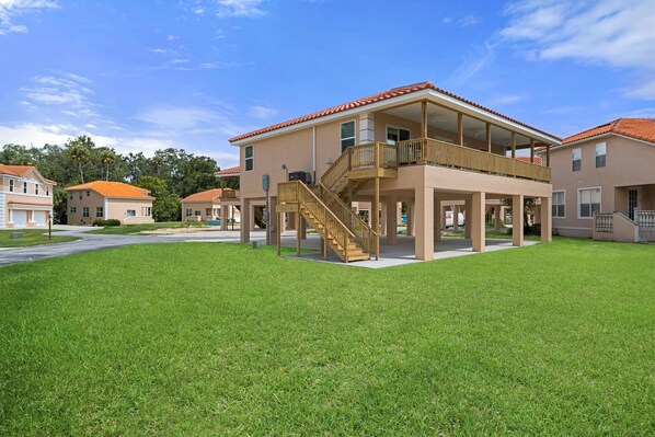 The 3 BR, 2 BA Tarpon on stilts with its huge porch overlooking the Marina