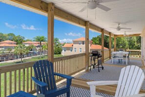 The porch overlooking the Marina. It has a dining and lounge area and a BBQ.
 