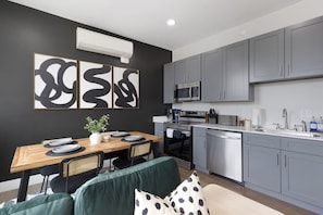 Start your mornings right with a fresh brew from our coffee maker and enjoy cooking with the fully equipped kitchen featuring premium utensils and essentials. Everything you need for a delightful stay is at your fingertips.