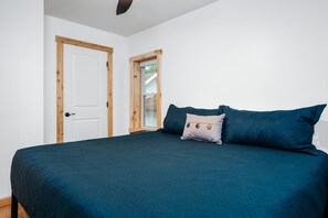 Bright and airy space with chic decor and a plush bed for dreamy nights!