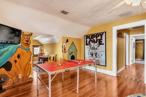 Fun game room area for kids to play ping pong and other activities on second floor!