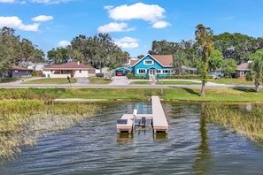 The lake is steps away from the house with a large dock!
