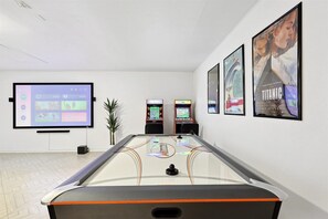 Incredible game room with movie theater to enjoy with kids and friends