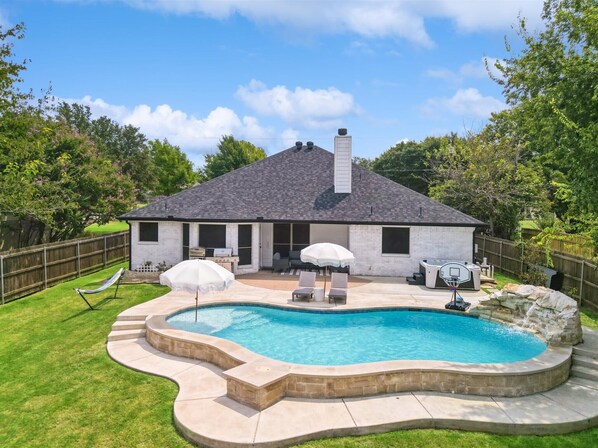 Beautiful pool, backyard with a grill and hot tub to enjoy with family and friends