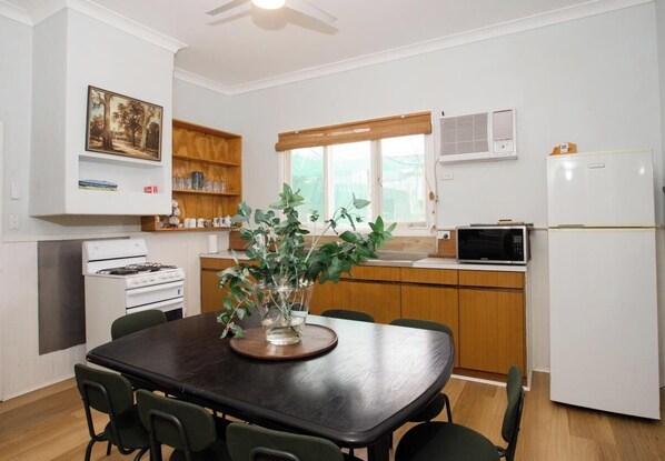 Enjoy the convenience of a well-equipped kitchen and dining area, perfect for preparing meals and gathering with loved ones.