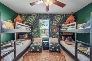 Vibrant Bunk Room with Exotic Accents