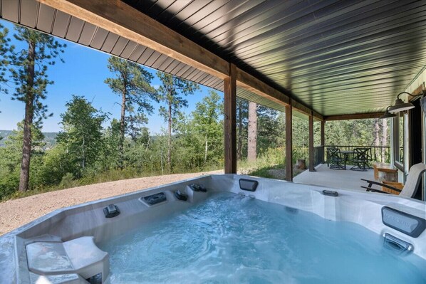Soak yourself in a hot tub or dine in the patio while watching the exquisite view of nature.