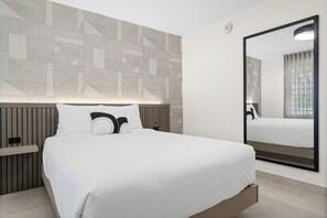 Indulge in ultimate comfort in this luxurious bedroom, showcasing a plush bed and elegant decor