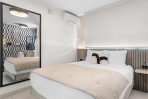 Indulge in ultimate comfort in this luxurious bedroom, showcasing a plush bed and elegant decor