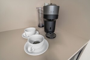 Wake up to the aroma of freshly brewed coffee, thanks to the in-room coffee maker.
