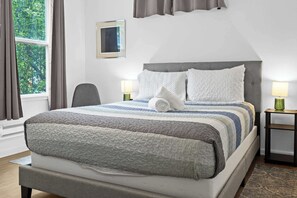 Bedroom: Enjoy modern comforts in the eco-friendly ambiance of our home