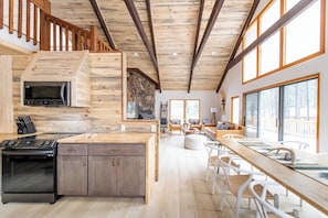 Climbing Bear | Easy Ski Access | Angel Fire, New Mexico | Cozy Rocky Mountain Cabin | Spacious Open Floor Plan | Inviting Living Room with Stone Fireplace | Fully Equipped Kitchen with Modern Appliances and Ample Counter Space | Expansive Deck for Enjoying the Fresh Mountain Air | Hot Tub and Fire Pit Coming October 1st | Perfect for Family Getaways or a Peaceful Retreat