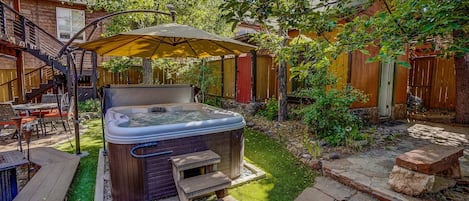 Private back yard with hot tub