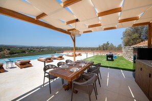 Dine alfresco in style with breathtaking views.