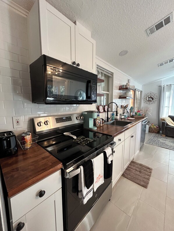 Beautiful large area, kitchen, living room, and queen size sofa beds opens up.