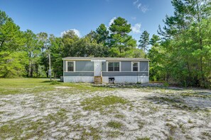 Home Exterior | Charcoal Grill | Central Air Conditioning