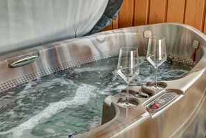 Relax and soak in the hot tub.