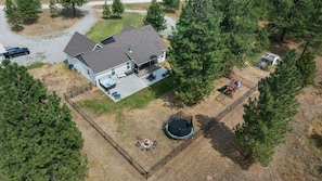 Backyard- Trampoline, Play Gym, Tire Swing, Hot Tub, Ice Baths, Walking Paths. 