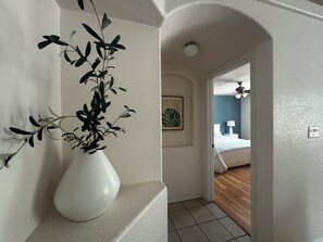 Short walkway to primary bedroom