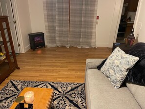 Electric fireplace recently added to living area.