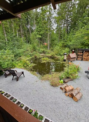 Enjoy the pond from the covered porch