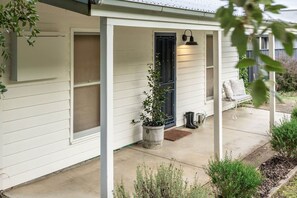 Enjoy a coffee in the morning on the front porch.