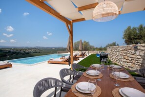 Experience alfresco dining with comfort and style.