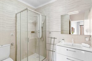 Bathroom with Toilet, Multi-Jet Shower and Sink