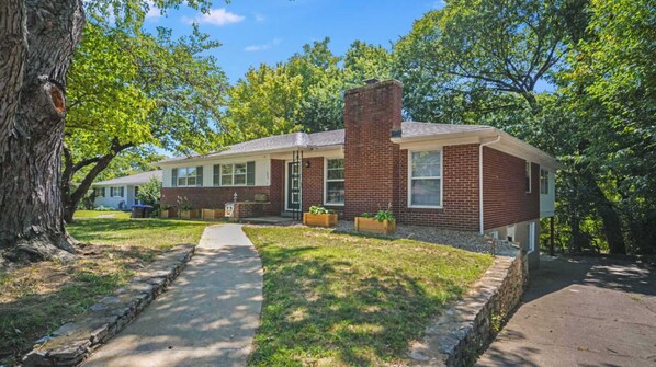 Home sweet home! Welcoming entrance of the house with timeless brickwork.