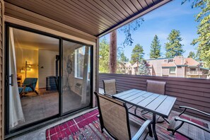 Large balcony with table and seating for four people is the perfect place for coffee