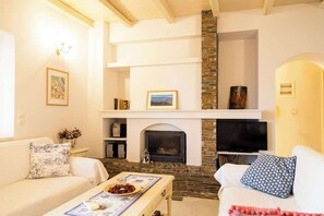 A snug corner to unwind with a book or glass of wine