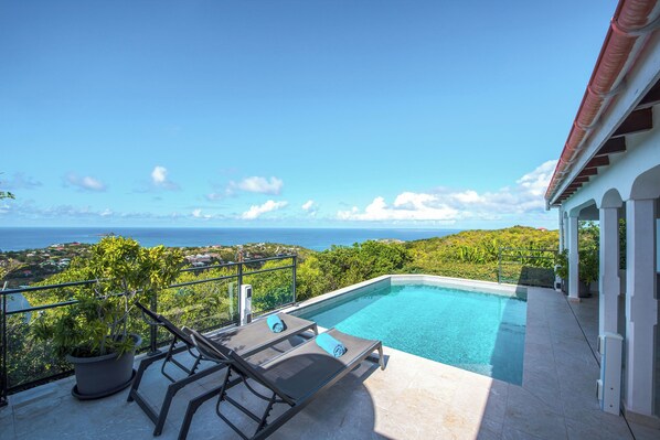 Heated swimming pool, alarm security system, lounge chairs, beach towels provided, beach chairs at disposal.