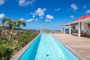 Nice pool, sunny expansive terrace with loungers and deckchairs.